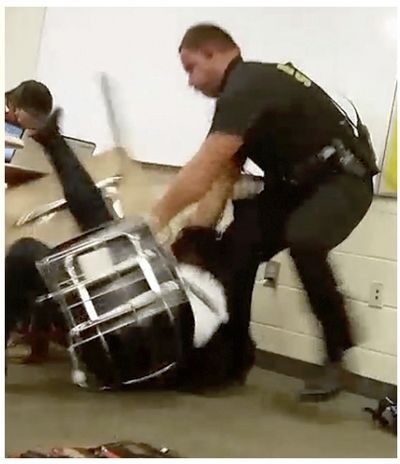screen-grabs of officer forcibly removing student from chair