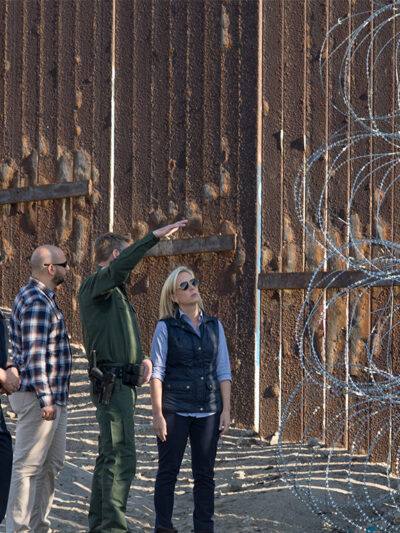 Secretary of Homeland Security Kirstjen M. Nielsen near the border fence at Border Field State Park