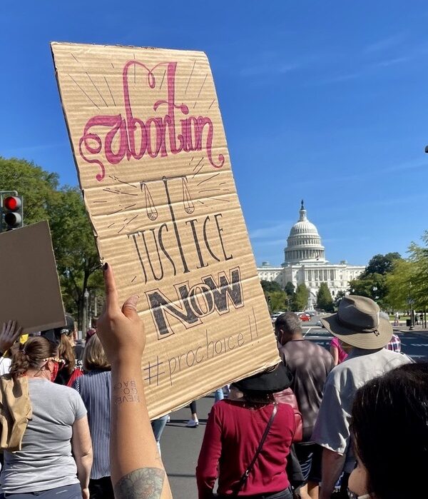 Rally sign, abortion justice now.jpeg
