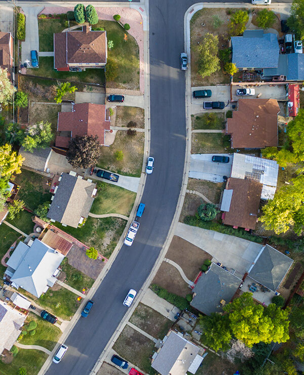 An aerial view of a neighborhood filled with houses.