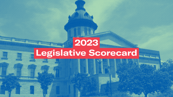"2023 Legislative Scorecard" in white text on a background photo of the South Carolina State House
