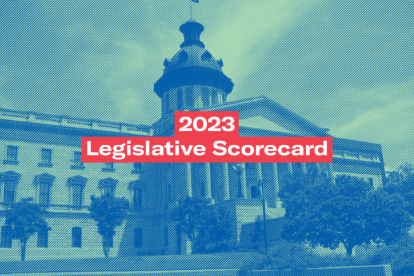 "2023 Legislative Scorecard" in white text on a background photo of the South Carolina State House