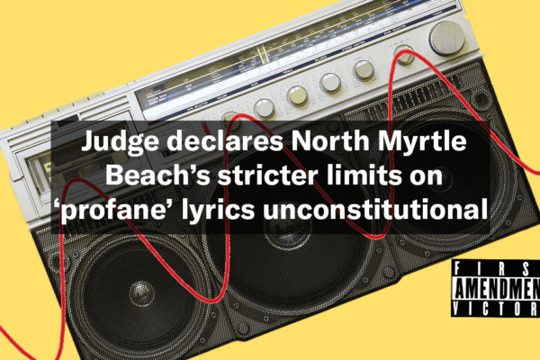 "Judge declares North Myrtle’s stricter limits on ‘profane’ lyrics unconstitutional." Text appears over an old-school boombox with a sticker in the style of the Parental Advisory logo reading "First Amendment Victory."