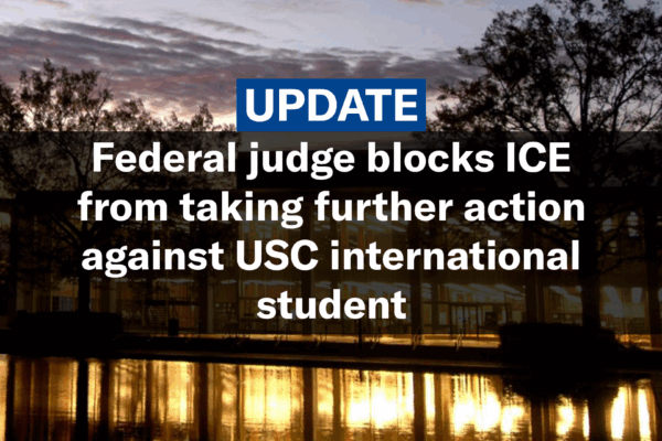 "Update: Federal judge blocks ICE from taking further action against USC international student." Text appears over a sunset photo of the Thomas Cooper Library.