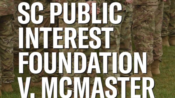 "SC Public Interest Foundation v. McMaster." Background photo of people wearing military fatigues on green grass.