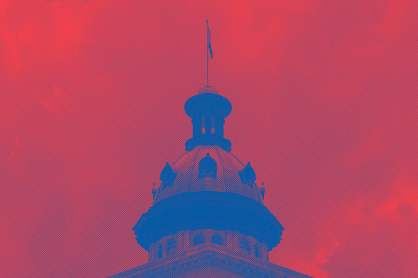 The South Carolina Statehouse dome under a dark red and blue tint.