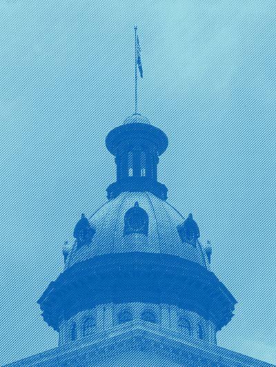 Photo of the South Carolina Statehouse dome with a light blue tint