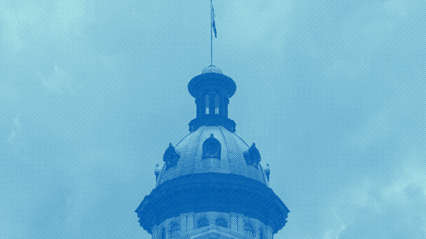 Photo of the South Carolina Statehouse dome with a light blue tint