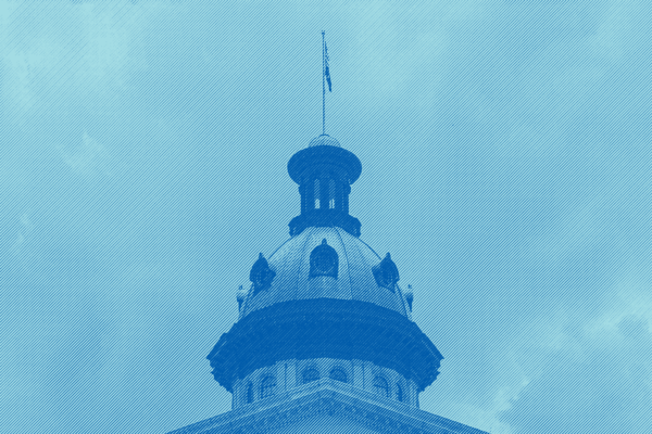 Photo of the South Carolina Statehouse dome with a light blue tint
