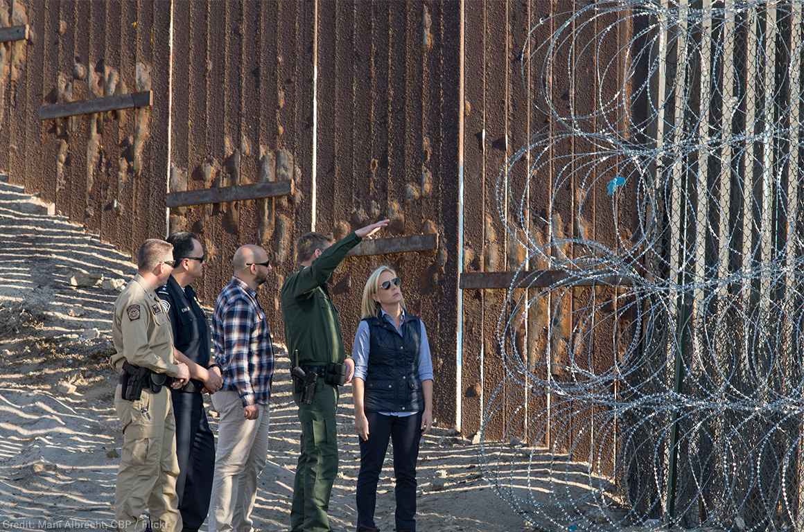 Secretary of Homeland Security Kirstjen M. Nielsen near the border fence at Border Field State Park