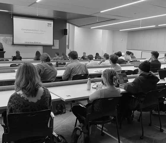 A speaker addresses a classroom of law students